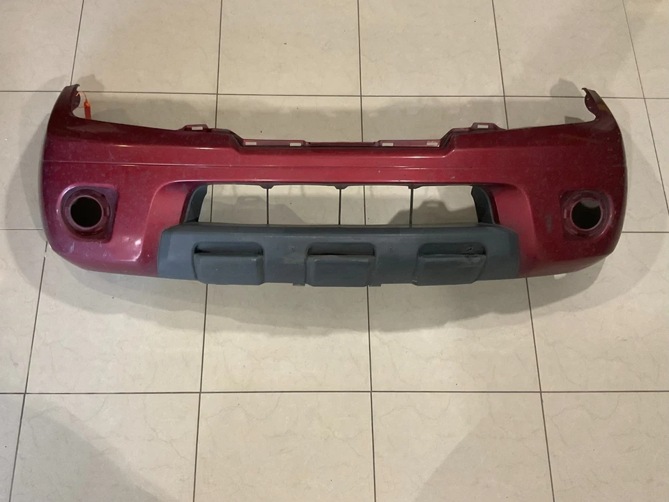 Cubierta de parachoques delantero roja Nissan Frontier 62022+zl00b 2009-2021 OEM Foto 1 de 4
