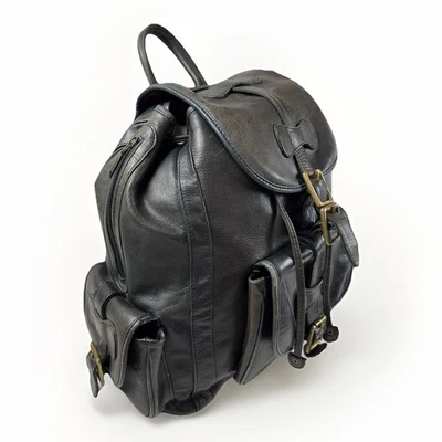 Mochila de cuero vintage mochila vintage garra de latón algodón forro a cuadros curtiduría Foto 1 de 4