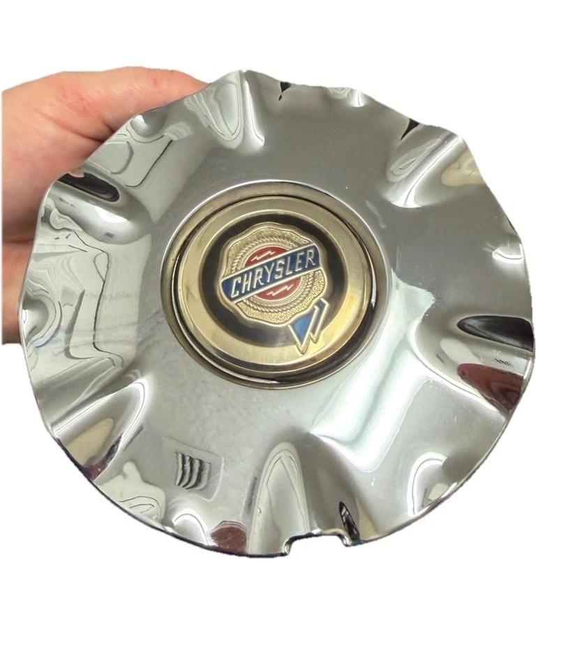 Tapacubos centrales cromados Chrysler Sebring 2001-2003 04782269AC OEM cromo NiCE Foto 1 de 4