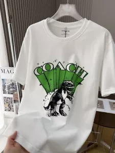 Neu mit Etikett Coach T-Shirt Herren Damen Unisex grün Dino weiß Baumwolle - Bild 1 von 8