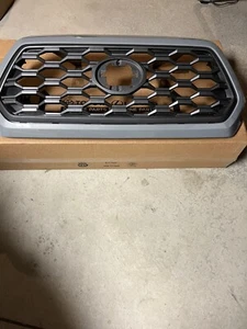 2016 2017 2018 2019 2020 2021 TOYOTA TACOMA TRD OFF ROAD GRILLE USED OEM - Picture 1 of 11