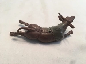 = 5''X 2'' PURPLE HARD RUBBER SITTING LAYING BRONCO BULL TOY FIGRE - Picture 1 of 4