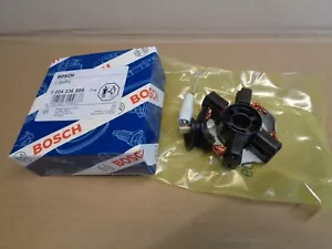 NEW GENUINE BOSCH 1004336599 CARBON BRUSH HOLDER VW 02B911209E FIAT 77364102 - Picture 1 of 3