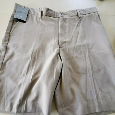 NUEVOS PANTALONES CORTOS DE GOLF DE VIAJE CLÁSICOS GREG NORMAN CAQUI TALLA 34 PARA HOMBRE Foto 1 de 3