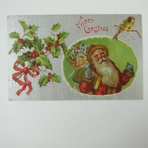 Antique Christmas Postcard Old World Santa Toys Holly & Bird Silver Embossed
