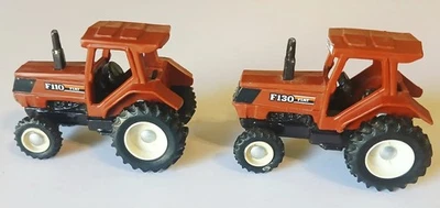 MODELOS ESCALA 1/64 FIAT F-110, F-130 GRANJA JUGUETE LOTE DE 2 TRACTORES, HESSTON Foto 1 de 3