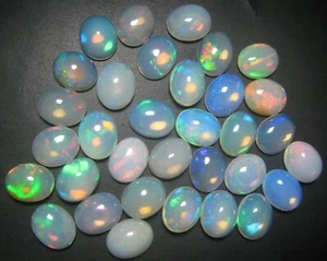 Natural Ethiopian Opal Oval Gemstone Cabochon 7x9 mm Loose Semi Precious Stone - Picture 1 of 10