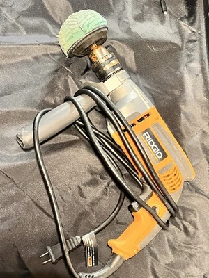 Taladro rígido reversible de velocidad variable Foto 1 de 2