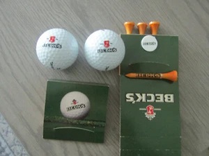 2 palline da golf Becks logo birra e 2 confezioni da golf da collezione golf uomo grotta - Foto 1 di 2