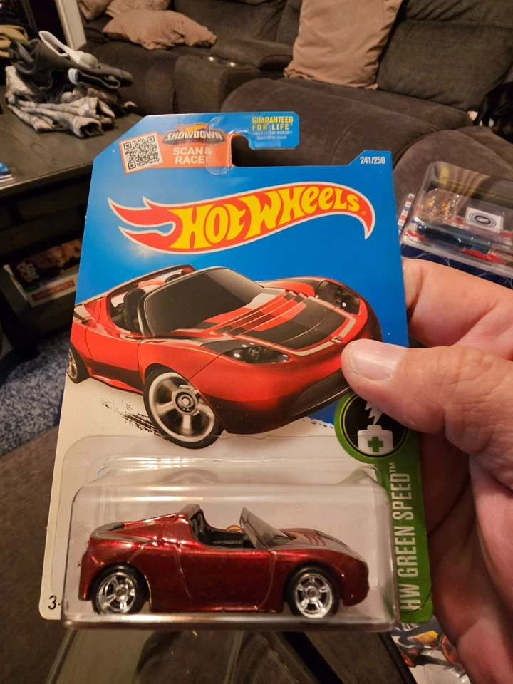 HOT WHEELS 2016 SUPER TREASURE HUNT *RED* TESLA ROADSTER SEALED MOC W/PROTECTOR - Image 1 of 4