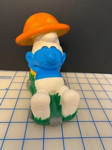 smurfs 2000 Peyo piggy bank laying under mushroom - Picture 1 of 3