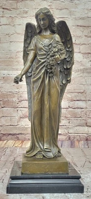 Ángel sosteniendo flores bronce metal estatua escultura mármol memorial cementerio Foto 1 de 4