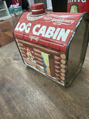 Log Cabin Syrup Tin. 100th Anniversary. 1887-1987. 24 oz size. Empty - Image 1 of 2