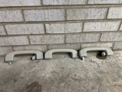 Juego de manijas de agarre interiores Nissan Máxima 2009-2014 (3) - gris claro - OEM Foto 1 de 4