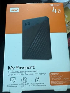 Disque dur externe portable WD 4 To My Passport WDBKJ0040BBK-WEWM - Photo 1/4