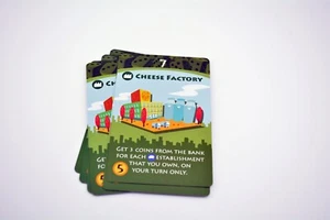 Machi Koro Spielteil Figuren - Versorgungsbetrieb Karten - Grünkäserei - Bild 1 von 2