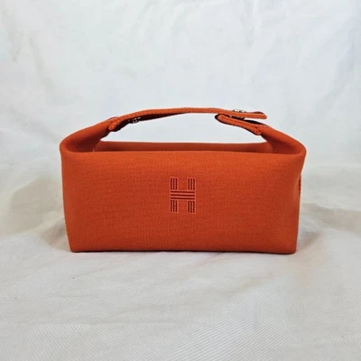 Hermès Orange Canvas Toile Bride-A-Brac Small Travel Case - Image 1 of 4