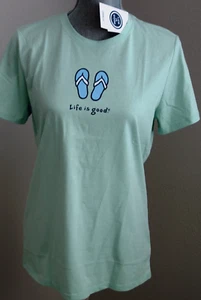 LIFE IS GOOD Women's MEDIUM Crew Neck FLIP FLOPS SANDAL S/S Tee Shirt Green NWT - Picture 1 of 1