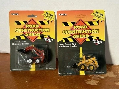 LOT OF 2 Road Construction Ahead JD675 & Hesston SL30 Skidsteer Loaders NIP 1/64 - Image 1 of 4