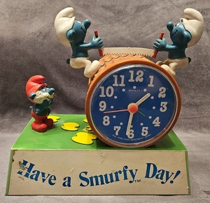 Vintage Smurf Talking Alarm Clock Bradley Sawing Wood 'Have A Smurfy Day' - Picture 1 of 6