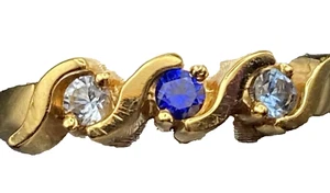Avon Anniversary Ring Gold Plated 3 Shades Blue Faux Sapphire Sz 6 Birthstone - Picture 1 of 11