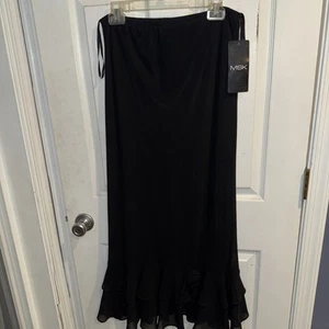 Neu mit Etikett MSK schwarzer Rock mit Rüschen unten elastischer Bund zum Überziehen Größe 12 mit Blume  - Bild 1 von 9