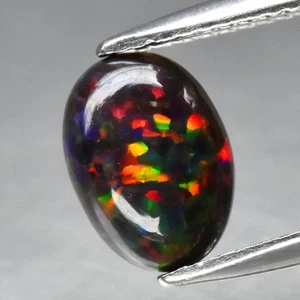 💎 1.19ct Oval Cabochon Natural Black Opal - Color Flash, Ethiopia Gemstone - Picture 1 of 4