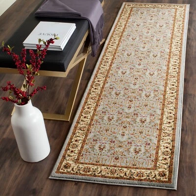 Light Blue Floral Polypropylene Rug 2' 3 x 6' Runner - Image 1 of 4