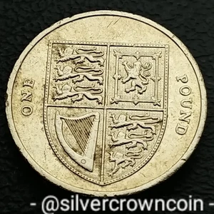 Great Britain 🇬🇧 UK 1 Pound 2014. One Dollar coin. Shield. Elizabeth ll.  - Picture 1 of 7