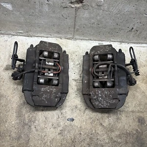 04-15 VOLKSWAGEN TOUAREG PORSCHE CAYENNE Q7  REAR BRAKE CALIPER SET - Picture 1 of 9