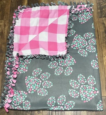 Manta gruesa de lana animal con estampado de patas Foto 1 de 2