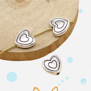 90 piezas cuentas espaciadoras de corazón de plata tibetana 10 mm hágalo usted mismo fabricación de joyas L14363 - Imagen 1 de 3