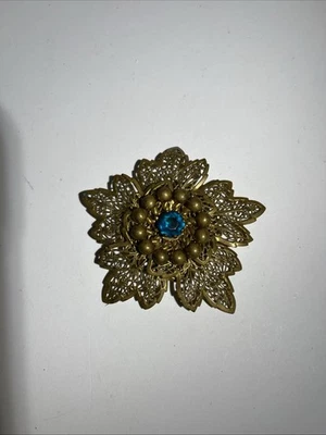 Vintage Costume Jewelry Gold Tone Blue Rhinestone Brooch - Image 1 of 4