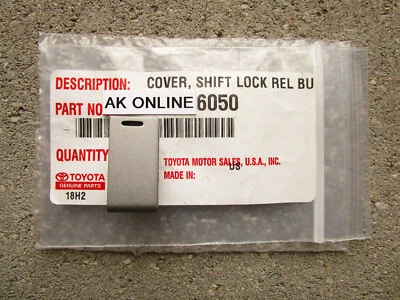 07 - 11 TOYOTA CAMRY A/T SHIFTER LOCK RELEASE BUTTON COVER OEM OEM NEW SILVER Foto 1 de 4