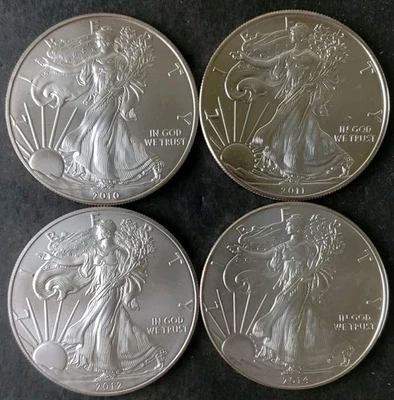 2010, 2011, 2012, and 2014 $1 American Silver Eagle Dollars - Image 1 of 3