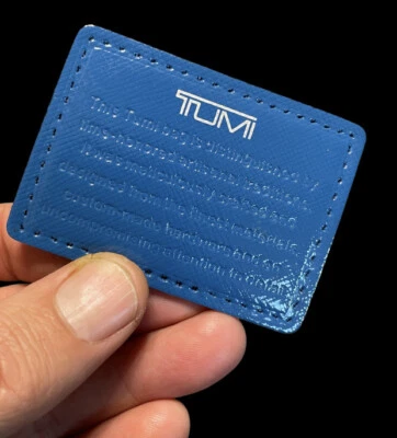 Authentic TUMI Handbag Sew On Blue Faux Leather Sew On Replacement Patch Logo - Image 1 of 4