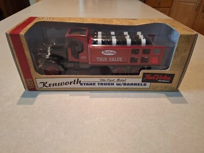 Ertl 1925 Kenworth Stake Truck With Barrels: True Value: 1/34 Scale Vintage 1994 - Image 1 of 4