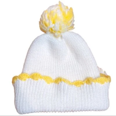 Gorra tejida de invierno con pompón blanco y amarillo Foto 1 de 3