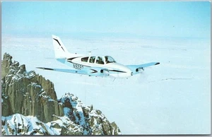 BEECHCRAFT Personal Aircraft Advertising Postcard "A55 Baron Over Shiprock Peak" - Picture 1 of 2