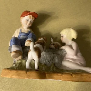 Paul Sebastian And Girl statue on bench wth dogs Porcelain/ceramic 1991 Size 5X6 - Picture 1 of 12