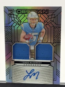 2024 Panini Obsidian - Rookie Materials Ink Ladd McConkey #RMI-LMY 93/99๐ฏ๐ฏ๐ฅ๐ฅ - Picture 1 of 2