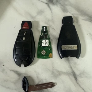 UNLOCKED ORIGINAL PROXIMITY JEEP 08-13 OEM FOB KEY LESS GO REMOTE FOBIK USA PEPS - Picture 1 of 4