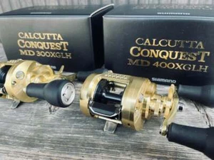 Shimano 23 Kalkutta Conquest MD Köderrolle Angeln verschiedene Größen Neu im Karton - Bild 1 von 1