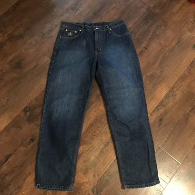 Jeans masculino Cinch em excelente estado usado ajuste solto etiqueta preta pedra escura tamanho 36 - Imagem 1 de 4