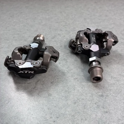 ¡COMO NUEVO! Pedales de bicicleta de montaña Shimano XTR PD-M9000 SPD sin clip 9/16" grava 2016 Foto 1 de 4