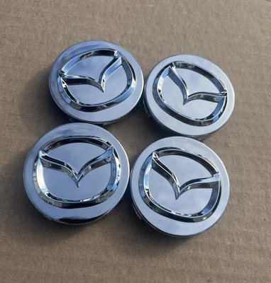 4 X MAZDA 56mm Silver Wheel Center Caps - Mazda 3/5/6, Miata, RX 8, CX-3/5/7/9.. - Image 1 of 4