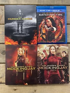 Hunger Games Bluray DVD lot of 4! Catching & Mocking Jay 1-2 Steelbook - Picture 1 of 5