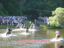 PHOTO  CROSSING THE TWEED AT THE BRAW LADS GATHERING RIDERS PARTICIPATING IN THE