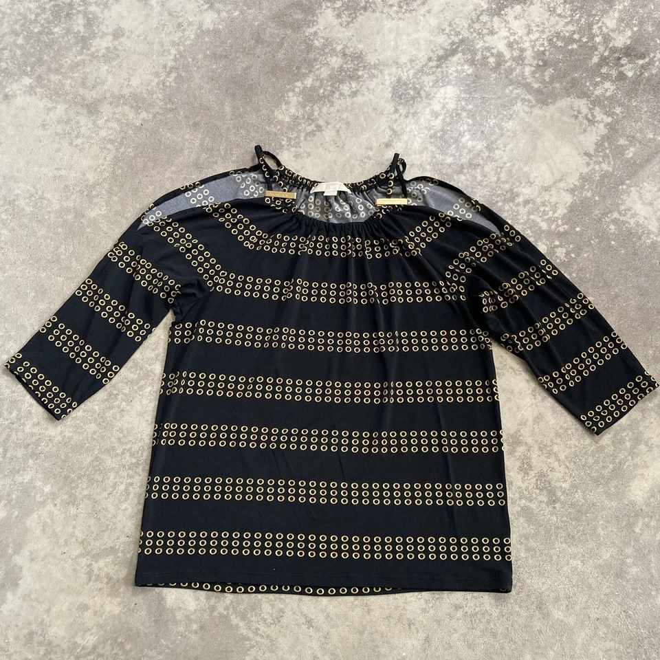 Blusa Michael Kors para mujer talla mediana hombro frío negra dorada logotipo herrajes Foto 1 de 4