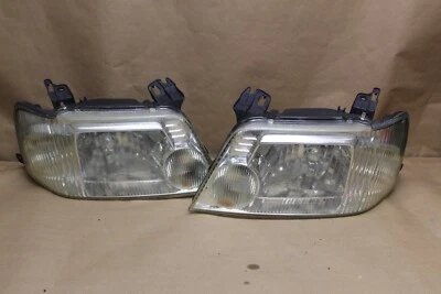 Par de luces de cabeza Mercury Mariner 2005-2007 OEM Foto 1 de 4